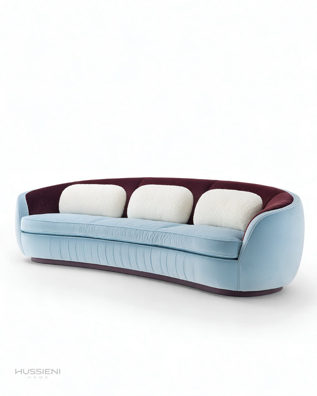 CIELO Curved Velvet Sofa in sky blue and plum - angled view