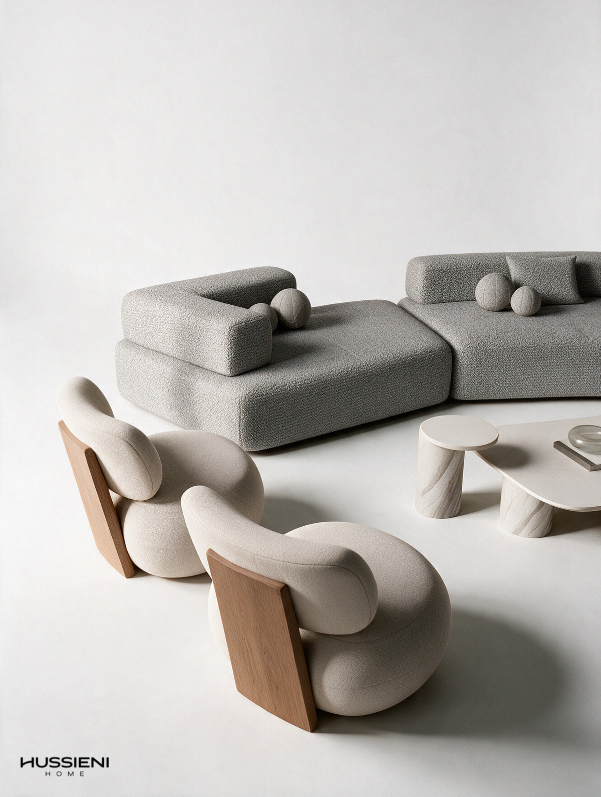 ROCCIA lounge chairs, modular sofa and marble tables - elevated view