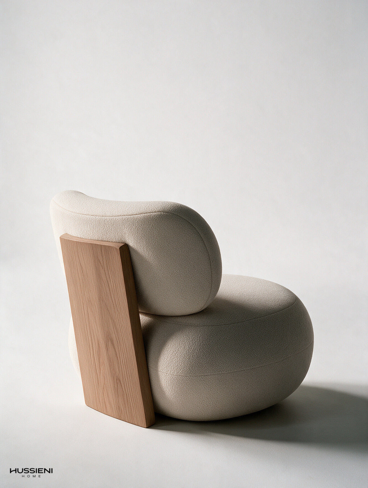 ROCCIA Boucle Lounge Chair with solid oak back panel