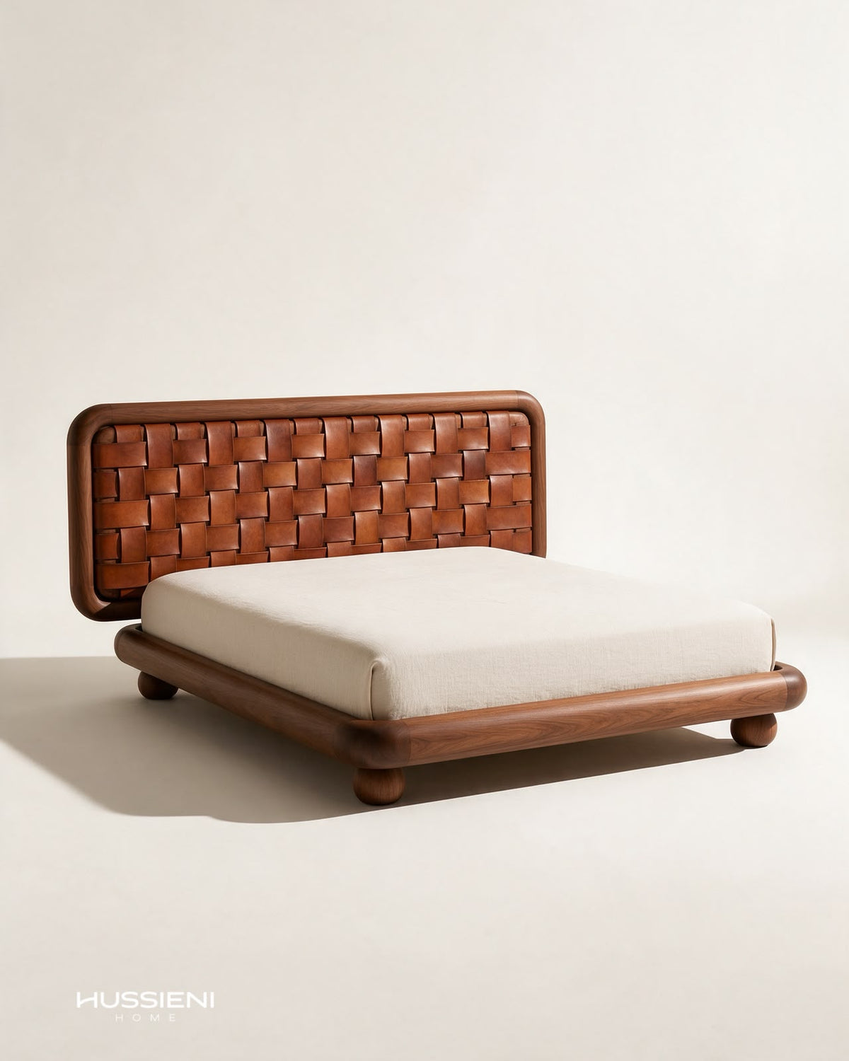 TRAMA Woven Leather Bed in walnut - angled view