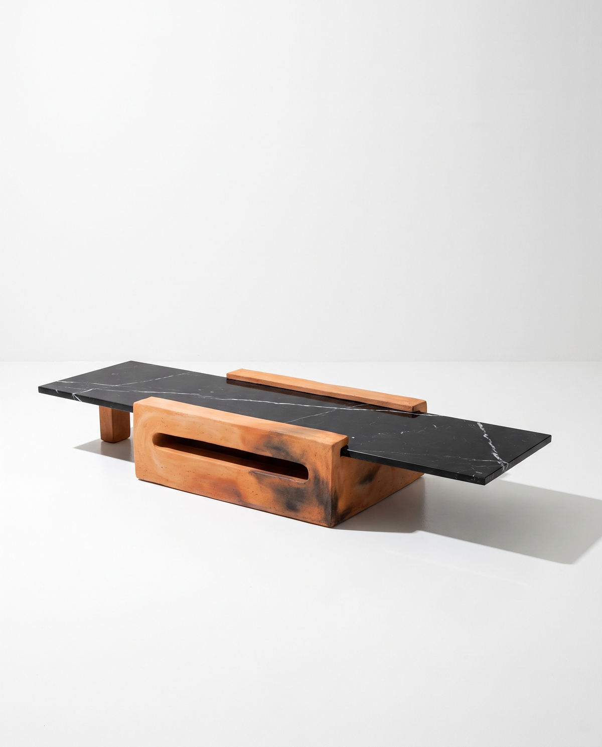 Terracotta and black marble coffee table