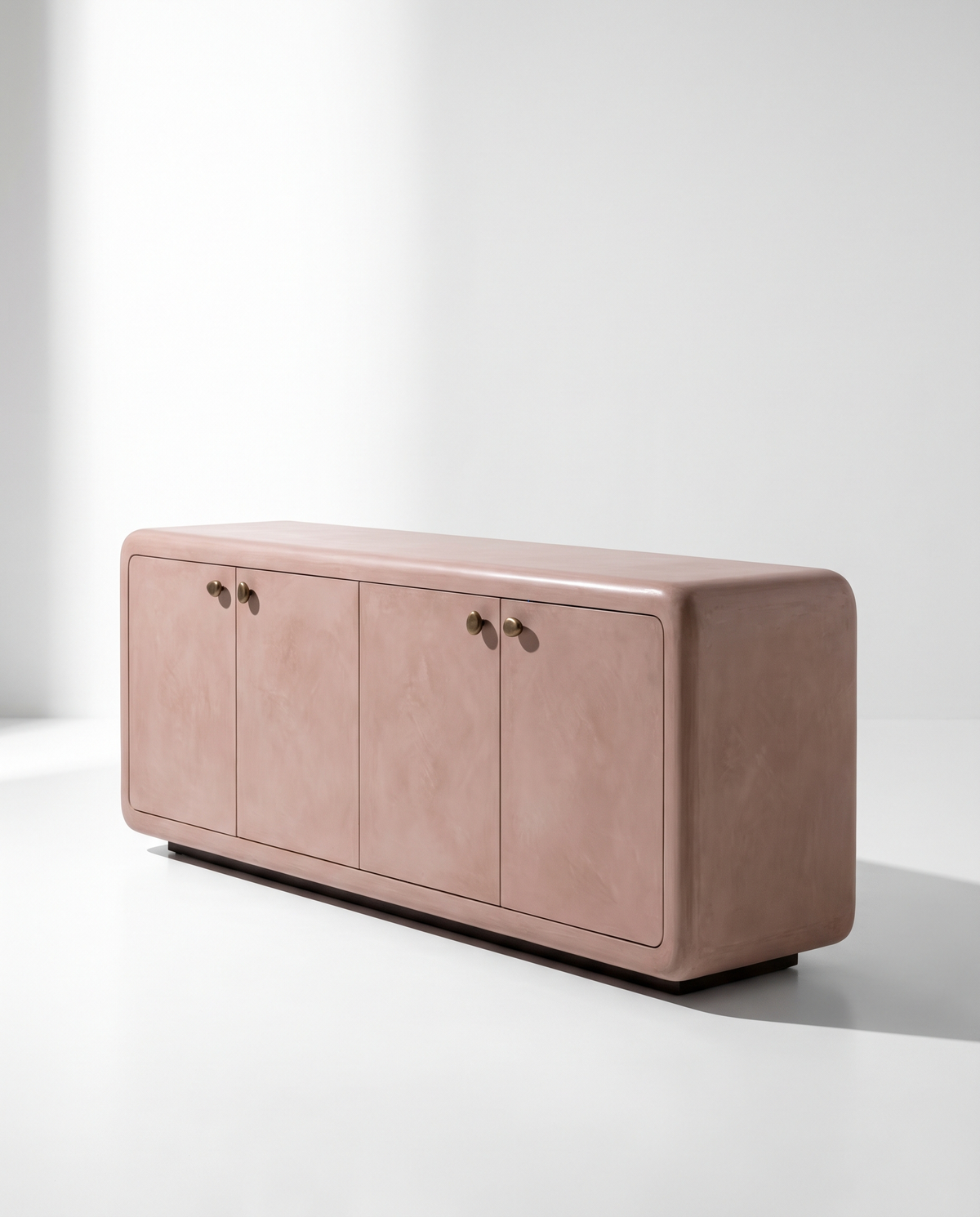 Pink lime plaster sideboard with bronze knobs